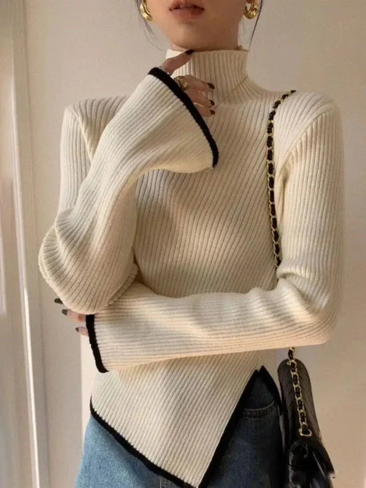 Mallory - knitted sweater with flared sleeves