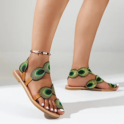 Vivien - Flat women's sandals with peacock motif