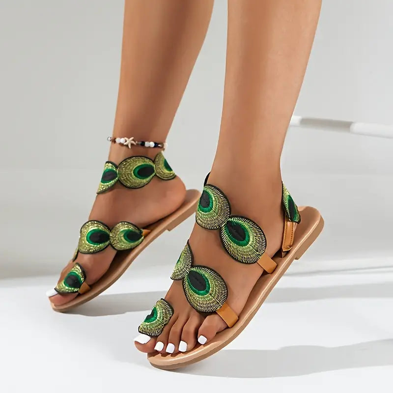 Vivien - Flat women's sandals with peacock motif
