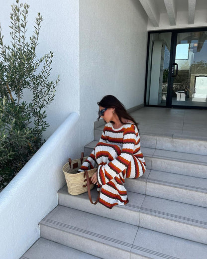 Eva - Robe longue dos nu rayée en tricot